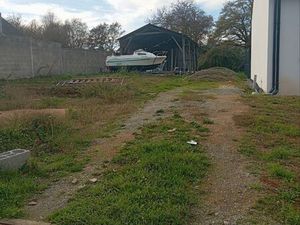 Loue terrain avec hangar