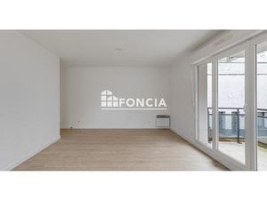 Appartement type 3 avec balcon et stationnement