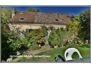 Dans cadre préservé  ancienne ferme rénovée et sa dépendance  piscine  sur 6.7 ha de...