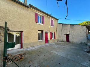 Vaste maison de ville de 102 m² avec cour privative actuellement louée