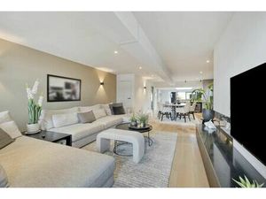 Exclusief triplex appartement met privé-lift en 2 slaapkamers  garage en staanplaats.