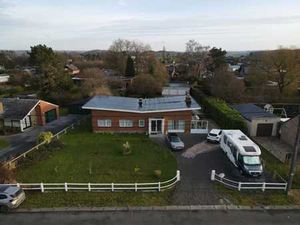 Maison de plain-pied avec très grand garage !