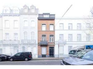 Une maison d’habitation et de rapport