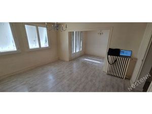 Appartement F4 avec balcon  cave et garage ? Centre-ville