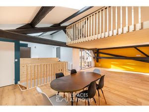 Maison rénovée avec terrasse et stationnements