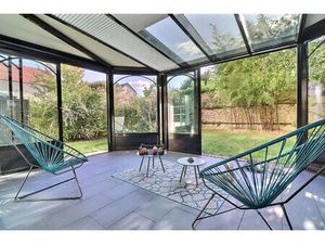 Appartement avec jardin 4 pièce(s) 132 m2 Carrez+ Véranda de 19m² + deux places de parking