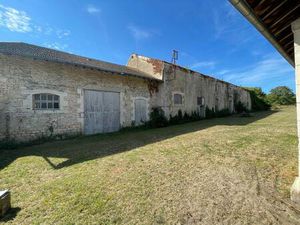 Bien Patrimonial avec terrain constructible