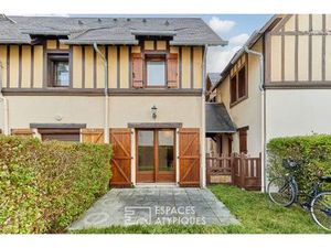 Cottage en triplex avec son jardin