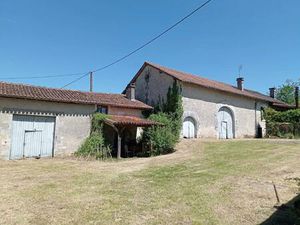 Ancienne ferme avec dépendances à rénover.
