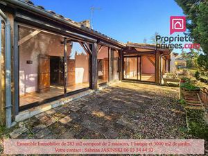 Ensemble immobilier  deux maisons  double garage et grand jardin