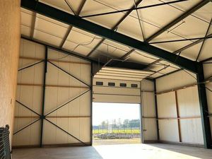 À LOUER – Espace de stockage 330 m² – Partie de hangar. Saint-Malo Situé à 300 m de la 4 v