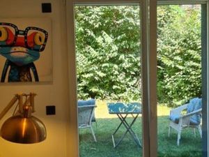 T2 bis 56m2 jardin + parkings + caves