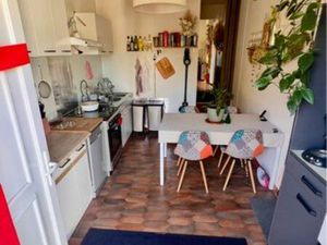 Appartement avec garage et terrain