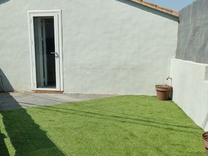 Maison de ville avec garage  cave et terrasse