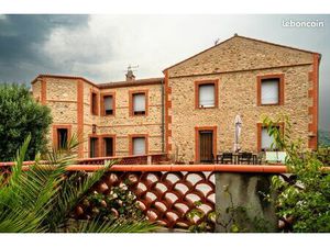 Appartement T2 au 2è étage d'une bâtisse en pierres