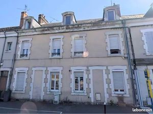 Ensemble immobilier complet – Immeuble + Maison + 15 garages 100% Loué