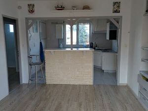 F4 traversant très lumineux cave et garage