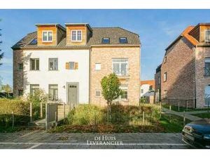 Luxe gelijkvloersappartement met 2 slpks  tuin en staanpl...