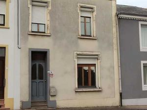 Maison 2 façades avec garage