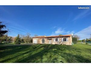 Maison plain pied avec jardin