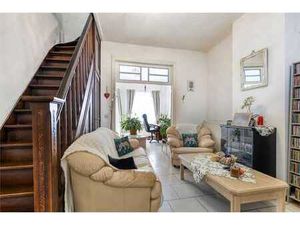 VERZORGDE BURGERWONING met tuin  GARAGE ACHTERAAN