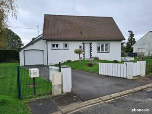 Maison en bon état dans quartier résidentiel