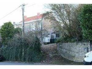 Maison 3 façades avec jardin et garage