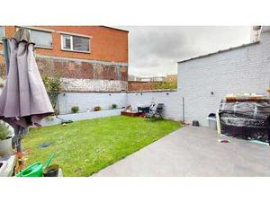 Rez-de-chaussée + jardin - 2 chambres