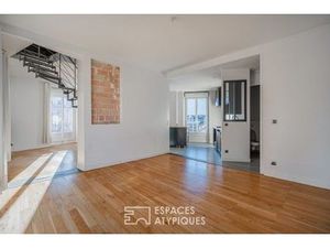 Duplex au centre ville en dernier étage avec vue montagnes