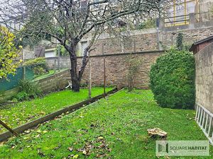 Maison de ville avec garage et jardin