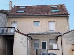 A vendre à Reims un appartement loué et une place de parking