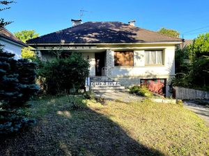 Maison non mitoyenne sur grand terrain