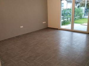 Loue appartement 3 pièces 56 m² Rez-de-jardin avec Terrasse 13 m²  jardin privatif Garage 