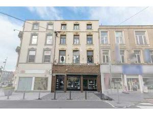 Immeuble de 3 appartements + commerce + garage à LA LOUVIERE