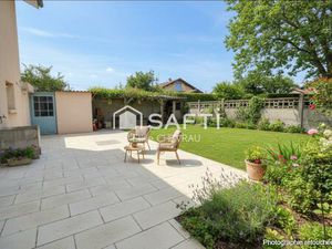 Appartement en rez-de-jardin  coeur de Bâgé-le-Châtel