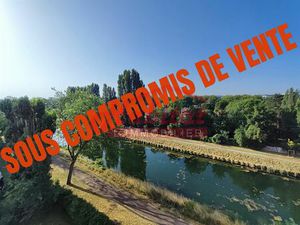 APPARTEMENT 4 PIECES AVEC CAVE- Vue sur Canal de la marne