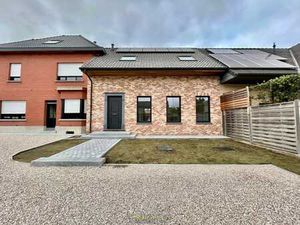 Te huur  nieuwbouwwoning met 2 slaapkamers en 2 garagebox...