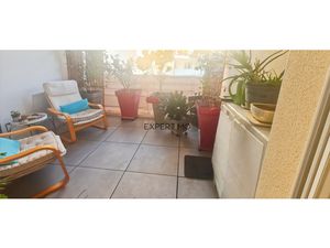 APPARTEMENT AVEC TERRASSE ET PARKING PRIVE