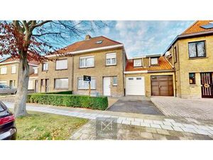 Te renoveren woning met tuin  garage en uitbreidingsmogelijkheden nabij centrum en Leie