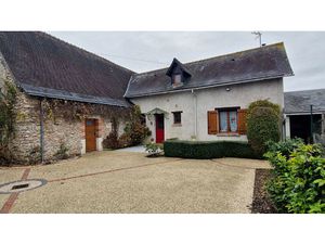 Bel environnement pour cette maison familiale avec grange et véranda