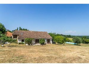 Stone property with pool on the edge of a village