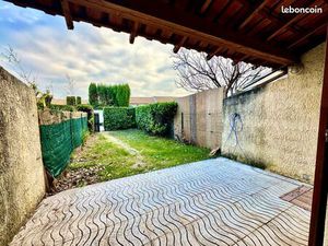 Maison mitoyenne AVEC JARDIN PRIVATIF