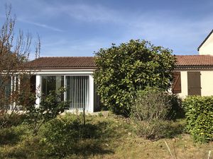 Charmante maison de plain-pied avec garage et jardin