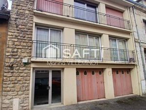 Immeuble de 2 appartements avec caves et garages