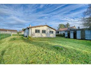 Maison de plain-pied 3 chambres - garage - Au calme