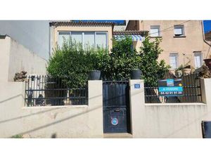 Maison de ville avec jardin composée de 2 appartements '