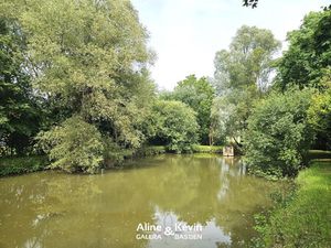 Parcelle avec étang  terrain clôturé et droit de pêche