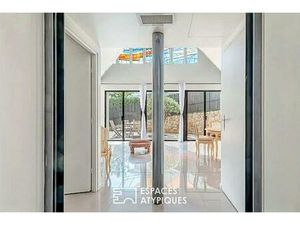 Chapelle désacralisée entièrement réhabilitée en loft