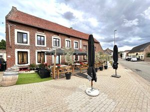 Ruim handelspand (café-restaurant) met terras  woonmogelijkheid en garage in Rutten (Tonge