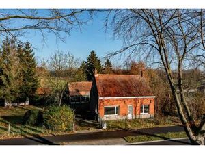 Te herbouwen of te slopen woning op ruim perceel in landelijke omgeving!